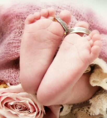 girl, baby and wedding ring