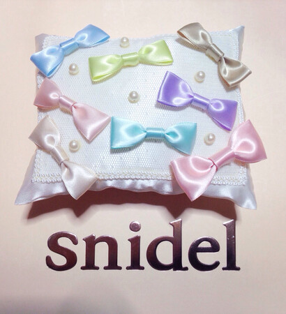pastel, ribbon and ring pillow