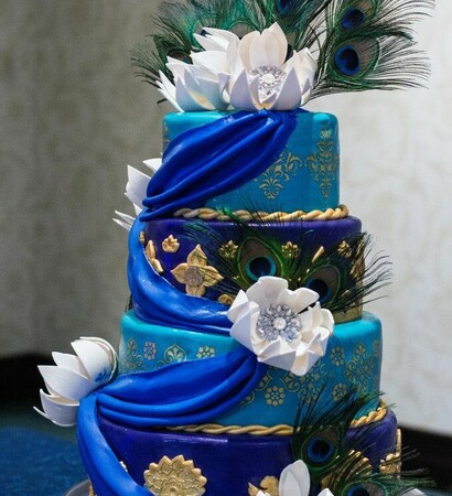 peacock, drapes and gold