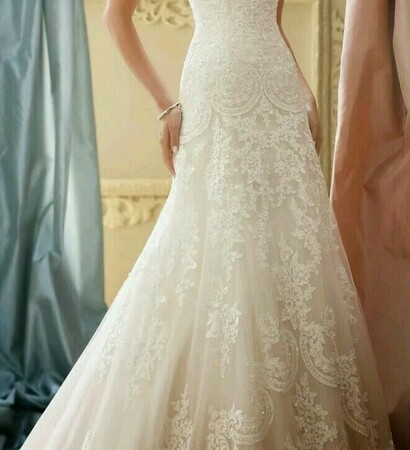 white, wedding dress and white pearl necklace