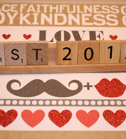 engagement props, love scrabble tiles and bride and groom