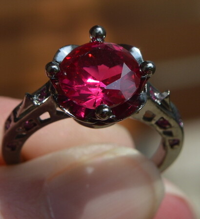 bride, gifts and black engagement rings