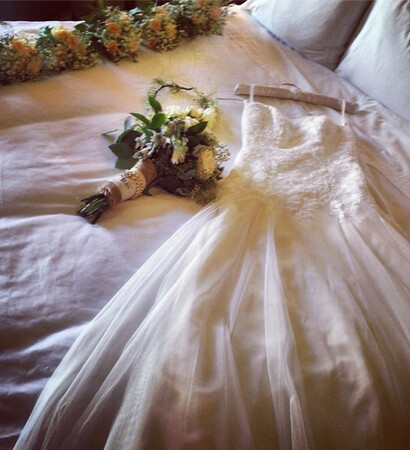 bed, bride and flowers