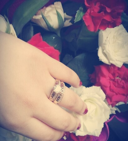 fiance, flowers and ring