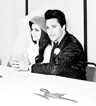 happy, suit and priscilla presley