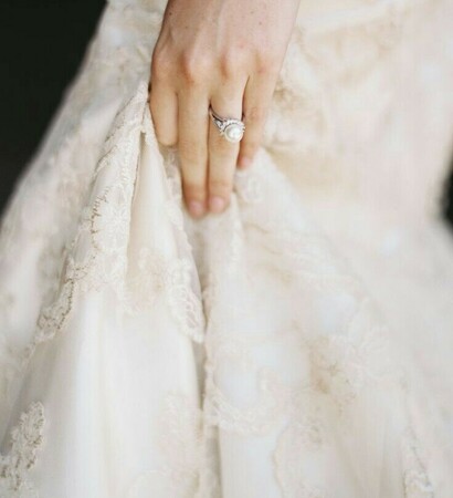engagement ring, bride and wedding dress