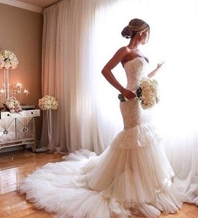 white, wedding gown and flowers