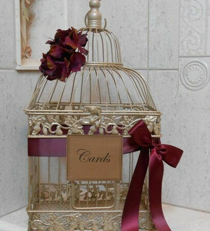 bow, birdcage and gold