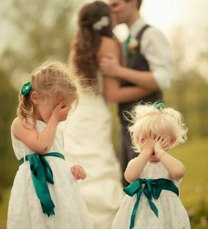 groom, kiss and flower girls