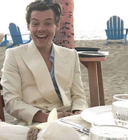 white, messy hair and suit