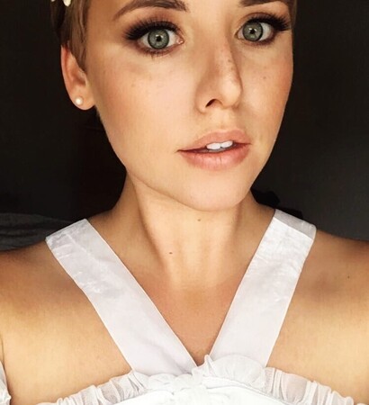 pixie cut, green eyes and city wedding