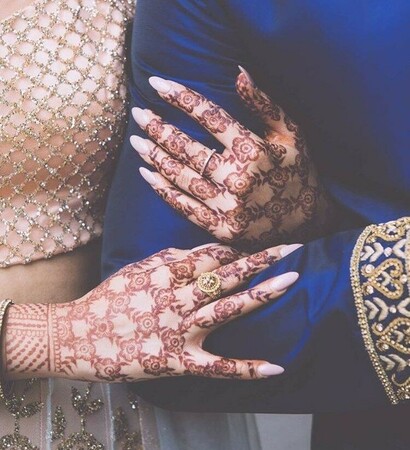 mehendi, henna and groom