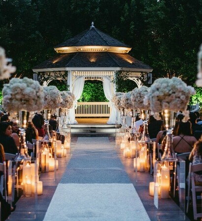flowers, candles and aisle