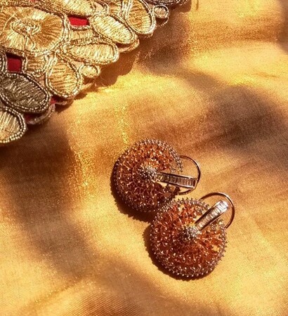 red and gold, gold earrings and jewelry