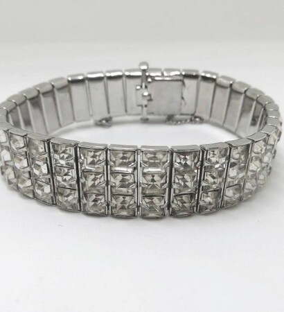 crystal clear stones, rhodium setting and channel set bracelet