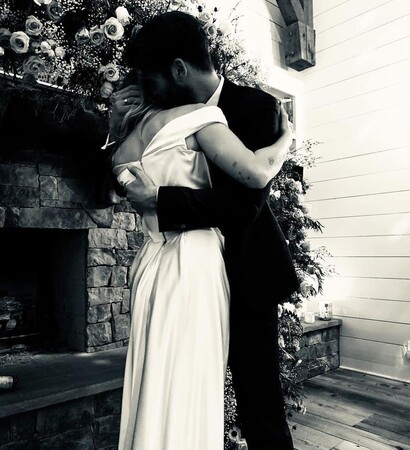 black and white, hug and suit