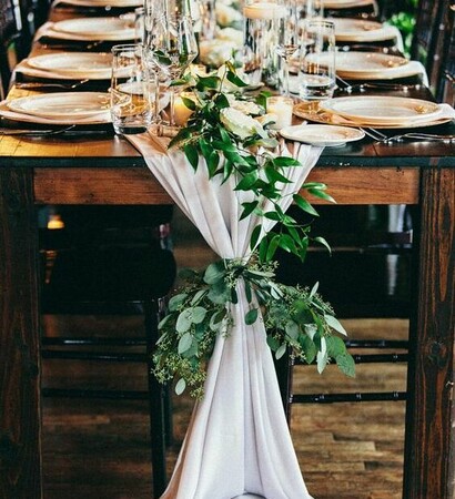 table, flowers and wedding party