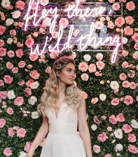 flower wall, party decor and neon sign
