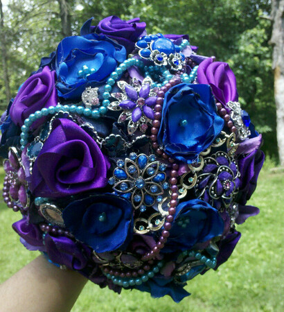 blue, purple. brooch and flowers