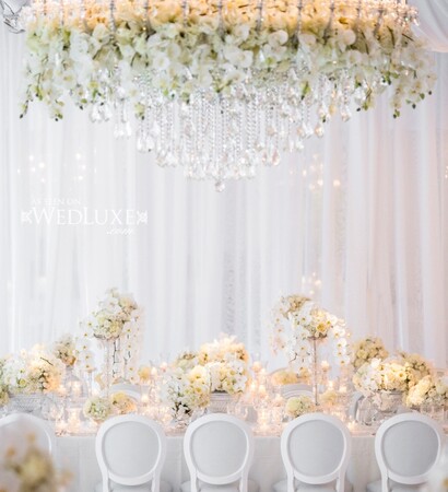white, flower chandelier and luxe wedding